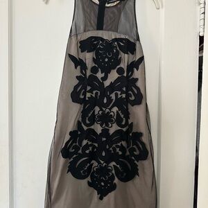 Elegant Black and Cream Sleeveless Dress